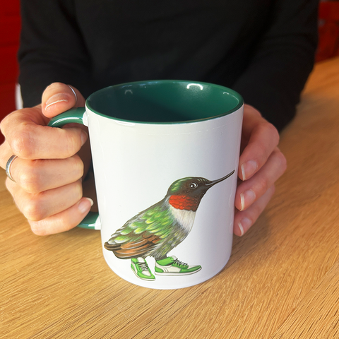 Hummingbird wearing sneakers Mug