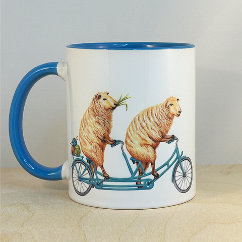 Sheep riding a Bike Mug