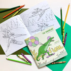  dinosaur coloring book by artist author and illustrator Amélie Legault, coloring book for children with dinosaurs, made in Canada, dinosaur snowboarding