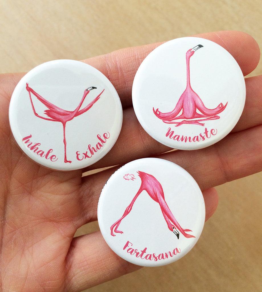 Magnet or pin of pink flamingo doing yoga